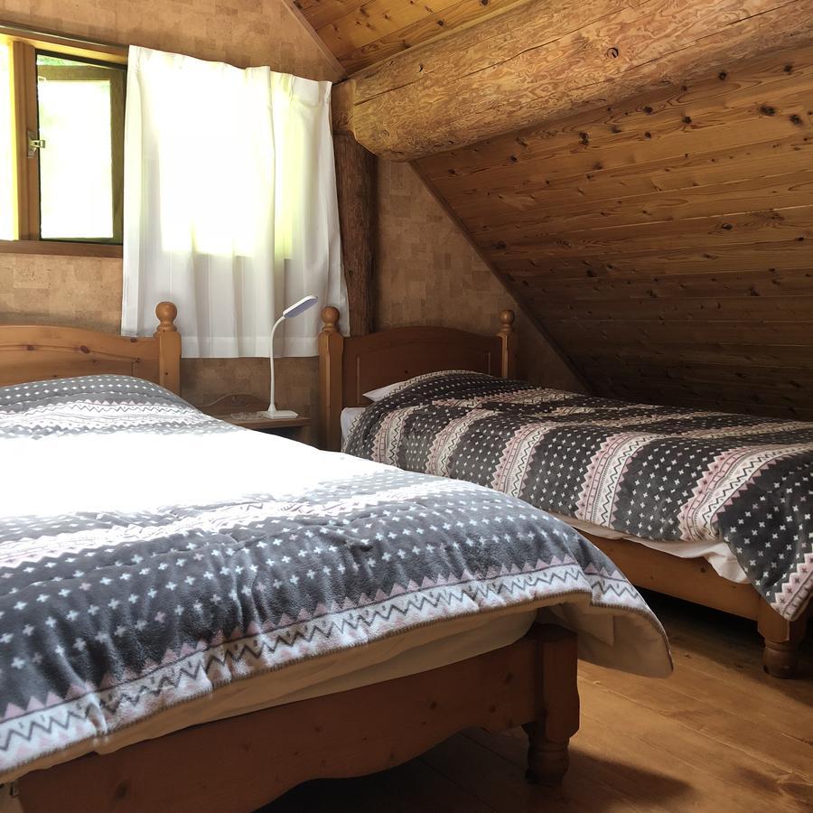 Yufuin Log House No Yado Tom Sawyer Hotel ภายนอก รูปภาพ